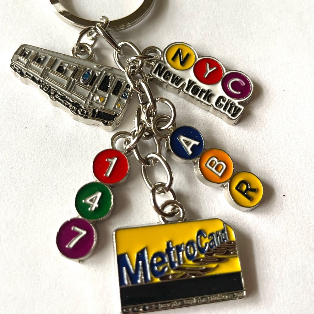 New York City Subway charm keychain key holder with cute NYC enameled charms.